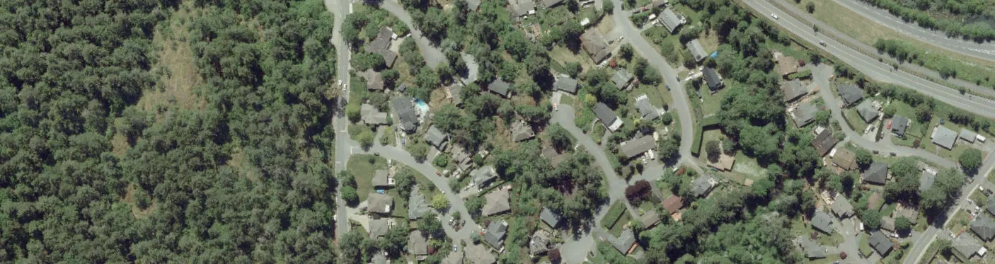 Aerial view of residential area and highway junction