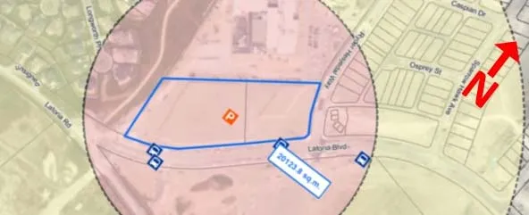 Map showing the potential park-and-ride site at Latoria Road and Ryder Hesjedal Way, with a blue outline around an area labeled "20123.8 sq.m." and an orange 'P' icon.