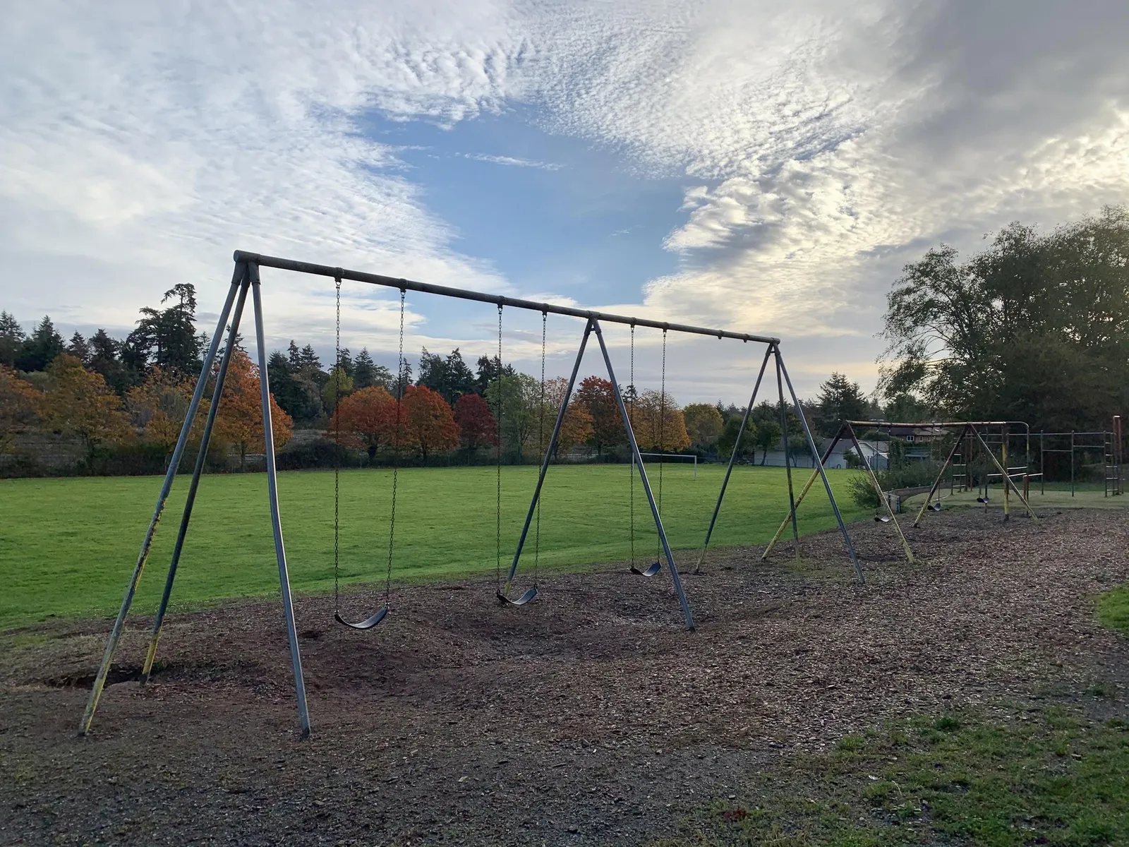 Photo of old swing sets before removal