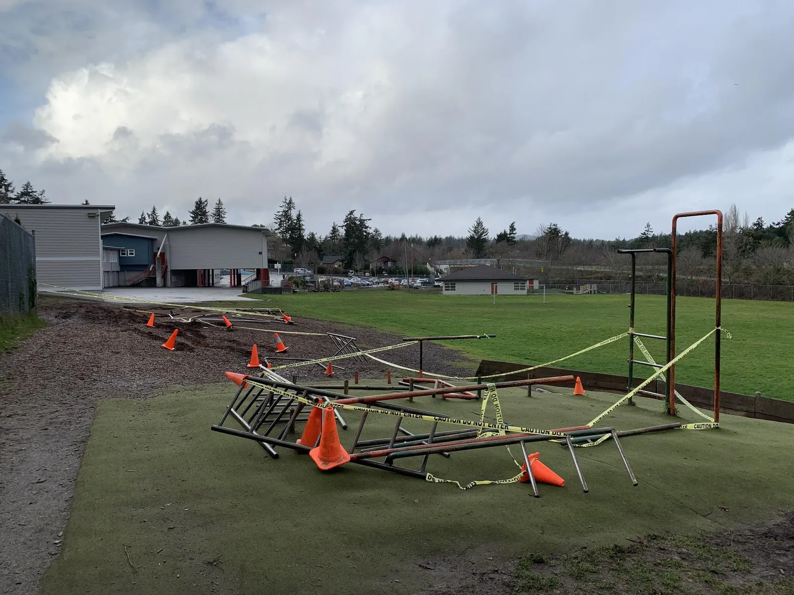 Photo of old playground equipment dismantled on the ground