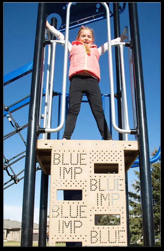 Photo of a child climbing a playground structure