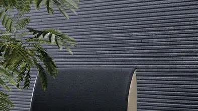 Close-up detail of charcoal cladding texture