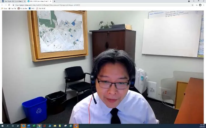 Webcast view of a staff member presenting from their computer