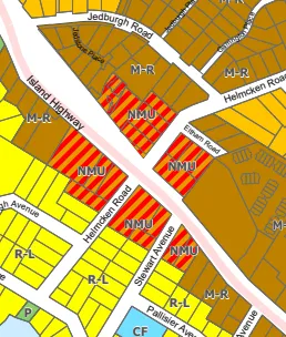 Land use map showing Neighbourhood Mixed Use (NMU) areas around the intersection of Helmcken Road and Island Highway, with a legend stating NMU allows up to 3 storeys and 1.5 FSR