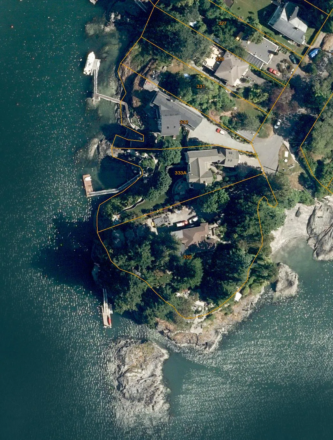Aerial subject property map of 333A Stewart Ave showing property lines and a red circle highlighting a dock