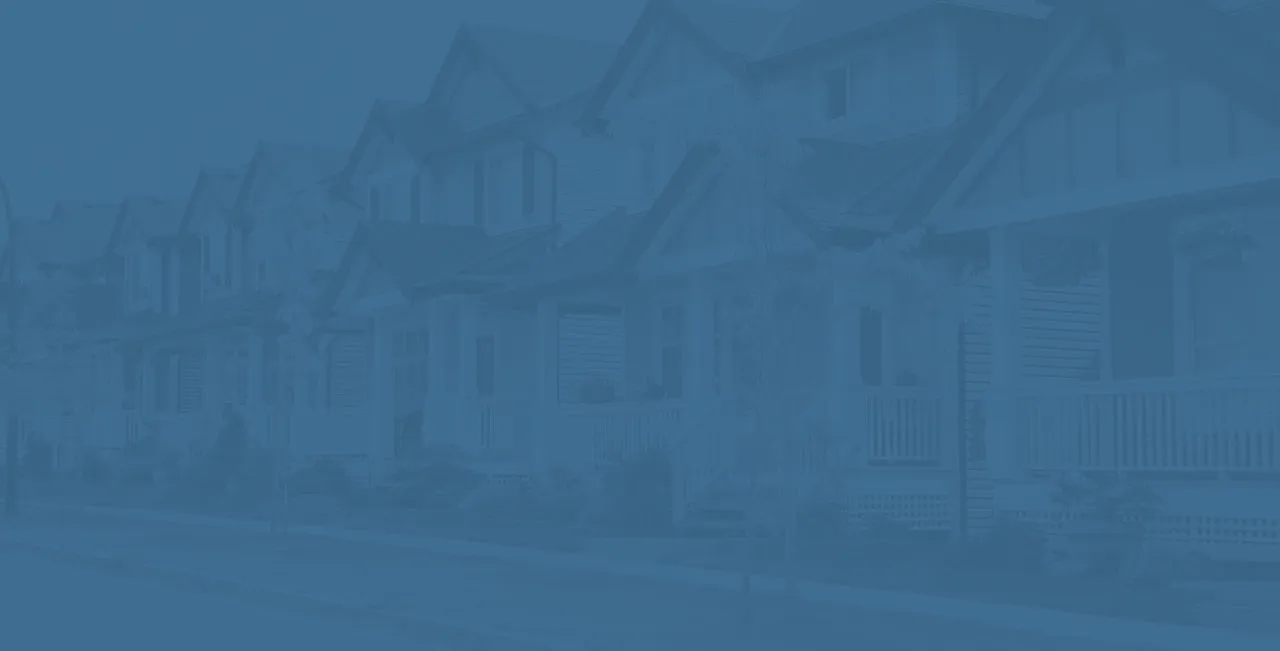 Blue-toned background image of a row of houses