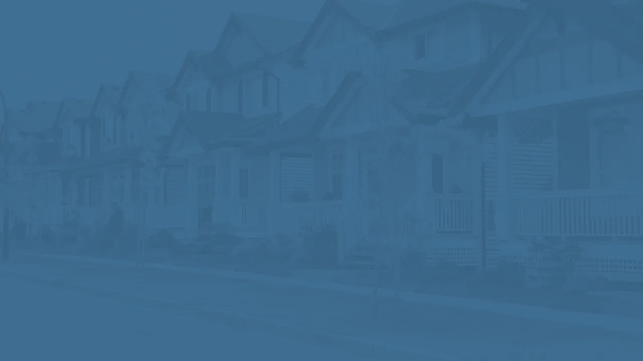Blue-toned background image of a row of houses
