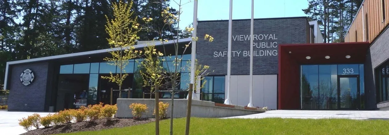 A view of the modern buildings and parking lot at Eagle Creek Village