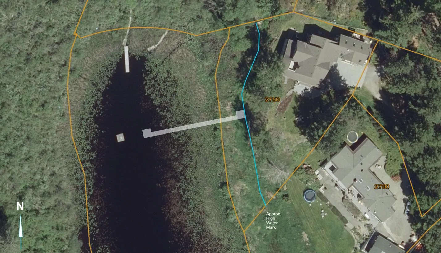 Detailed aerial view with property boundaries, showing the proposed dock layout and high water mark
