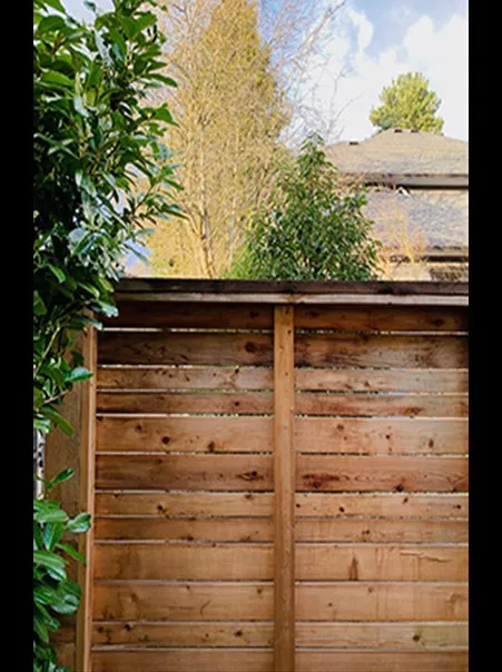 Photo of wooden fence with annotations regarding sightlines from the neighbor's front door