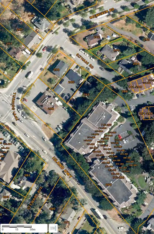 Aerial orthophoto map showing property boundaries and house numbers for a residential and commercial area located near the intersection of Island Highway, Eltham Road, and Helmcken Road.