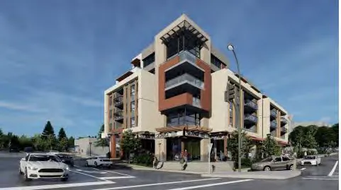 High-angle architectural rendering of the building as seen from across the highway, demonstrating the setback of the upper floors