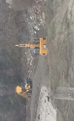 Heavy machinery performing beach nourishment work