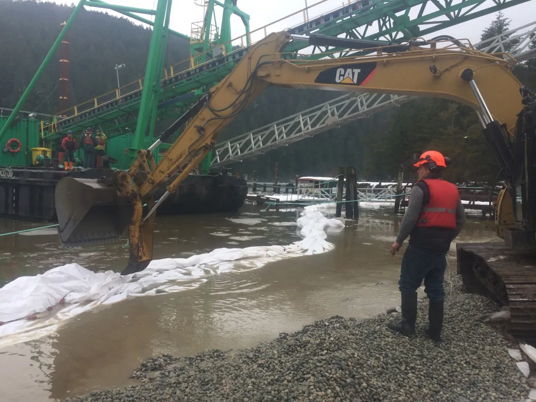 Tod Inlet Beach project site showing a CAT excavator on gravel