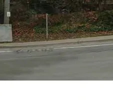 Pedestrian-level rendering looking east along the retail sidewalk on Island Highway