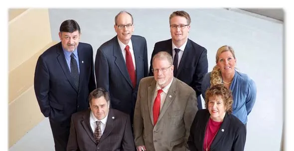Top half of a group portrait featuring the West Kelowna Mayor and Council members