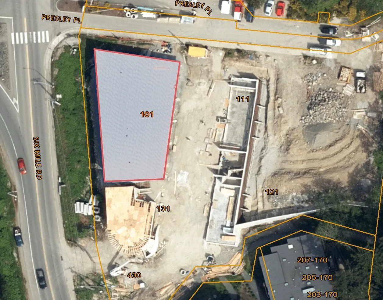 Aerial orthophoto of the subject property showing construction progress and property line overlays with building unit numbers 101, 111, 121, 131, and 430.
