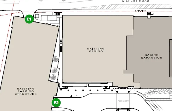 Photos and dimensions of existing Parking Signs E1 and E2 at the parkade entrances