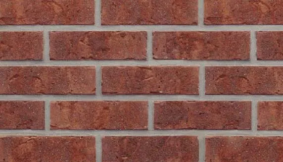 Red-toned brick masonry texture