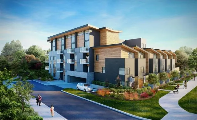 Close-up architectural rendering of townhouse windows and gabled entrances
