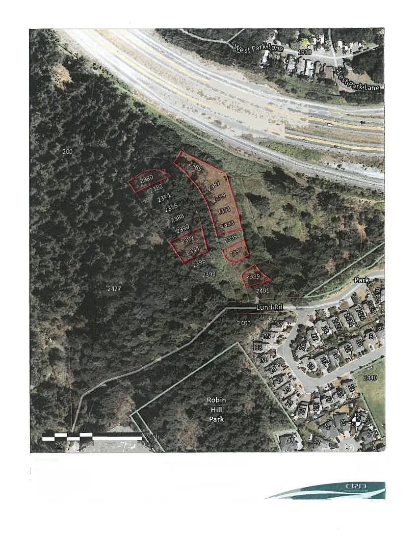 Subject Property Map showing lot numbers 2380, 2382, 2384, 2386, 2388, 2390, 2392, 2394, 2396, 2398, 2385, 2387, 2389, 2391, 2393, 2395, 2397, 2399, and 2401 along Lund Rd, adjacent to the Trans-Canada Hwy and Robin Hill Park