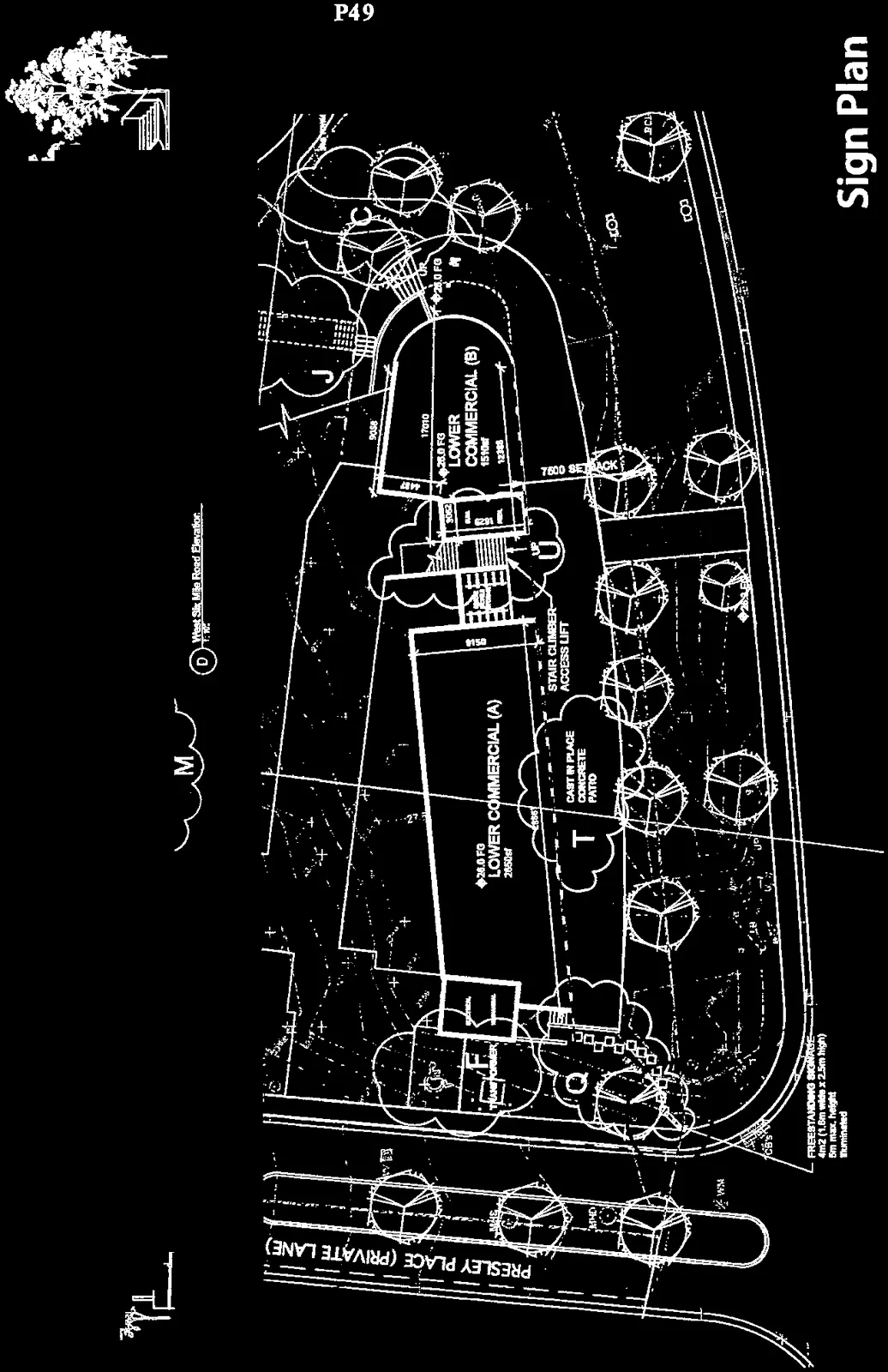 Comprehensive site plan showing building footprints, commercial areas, landscaping, and sign placement