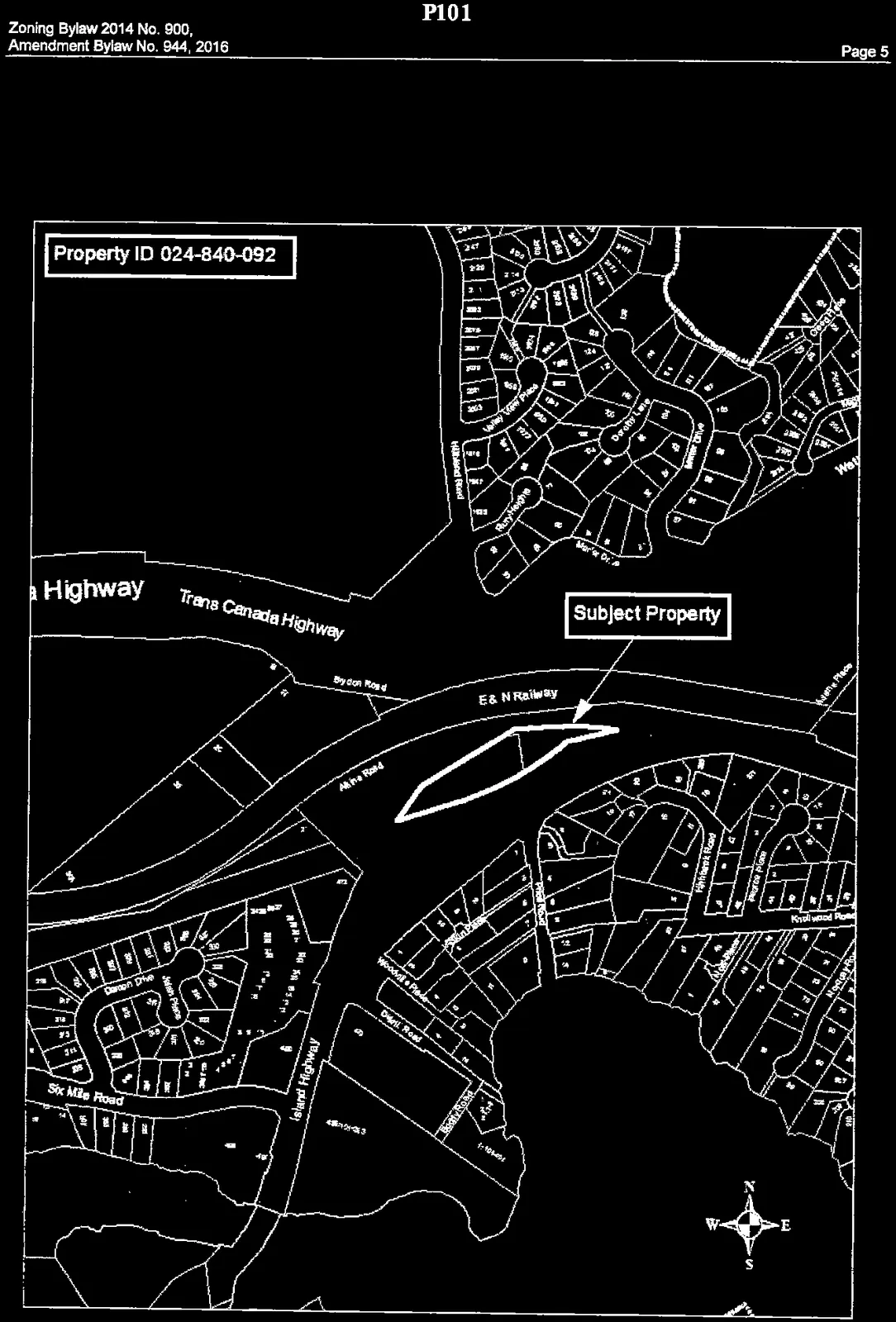 Zoning map highlighting the Subject Property located between the E & N Railway and Trans Canada Highway, showing neighboring roads such as Island Highway, Six Mile Road, and Atkins Road